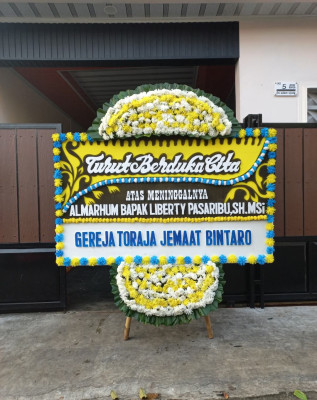 Papan Bunga Duka di Paro